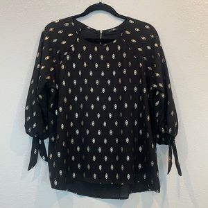Papermoon for stitchfix. Black with gold diamond design.
